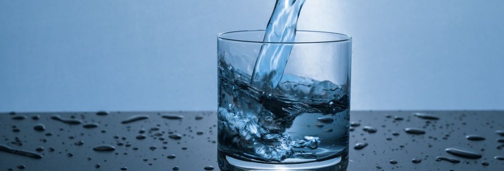 Water splashing over an open hand