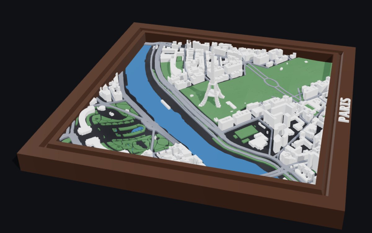 A BambiMaps relief of Paris: the Eiffel Tower, the Champ de Mars and the Seine inside a walnut frame lettered PARIS