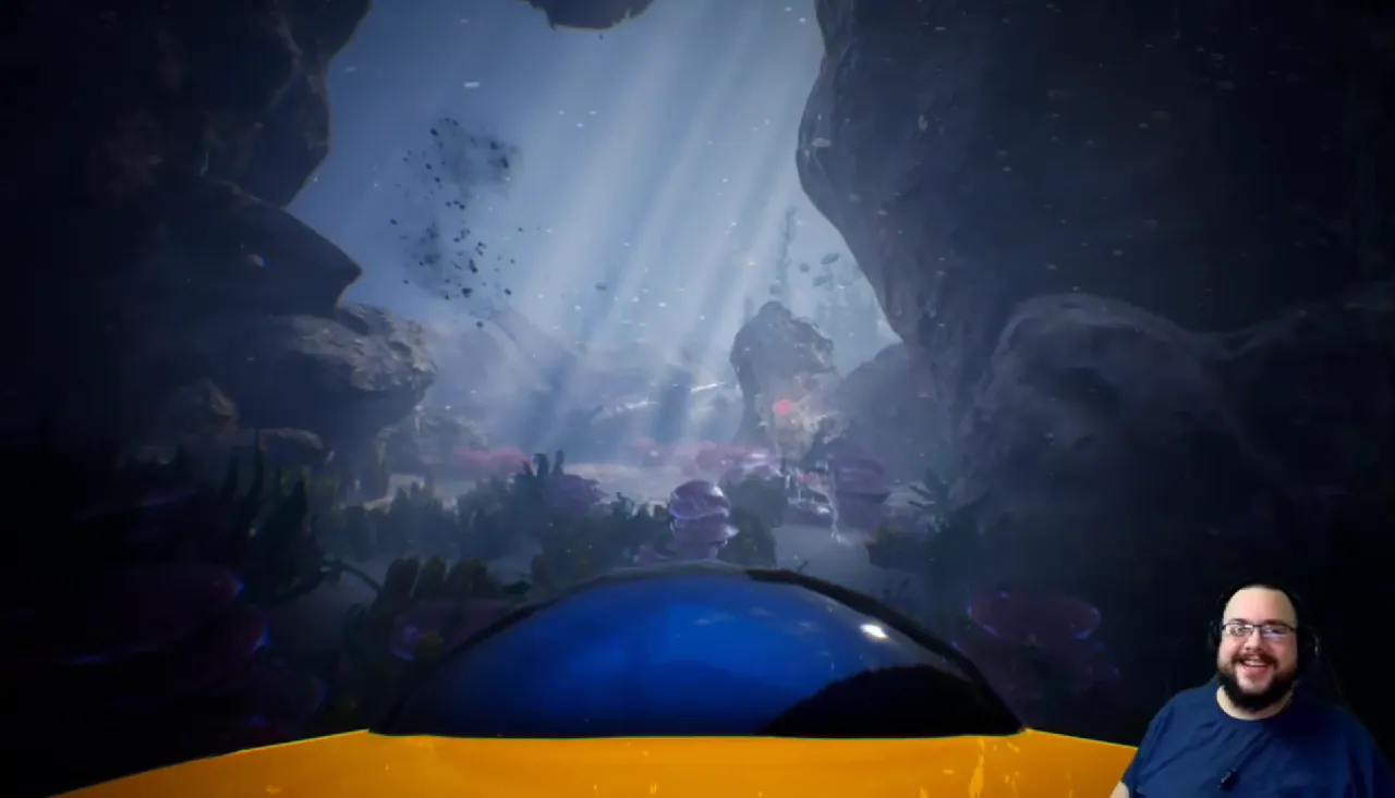 Underwater canyon seen from the rover, with the yellow ROV frame in the foreground