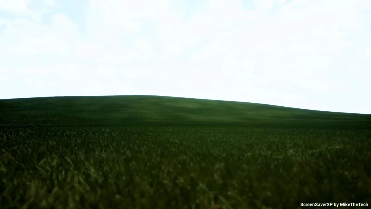 Green 3D hill under a cloudy blue sky